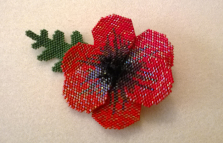 weaving poppies from beads