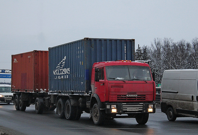 KamAZ-53215 with a trailer carries goods