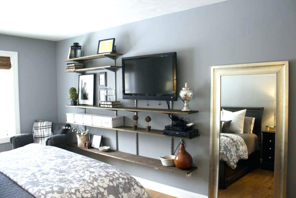 Высота телевизора на стене в спальне: способы размещения, удобство просмотра и советы по установке