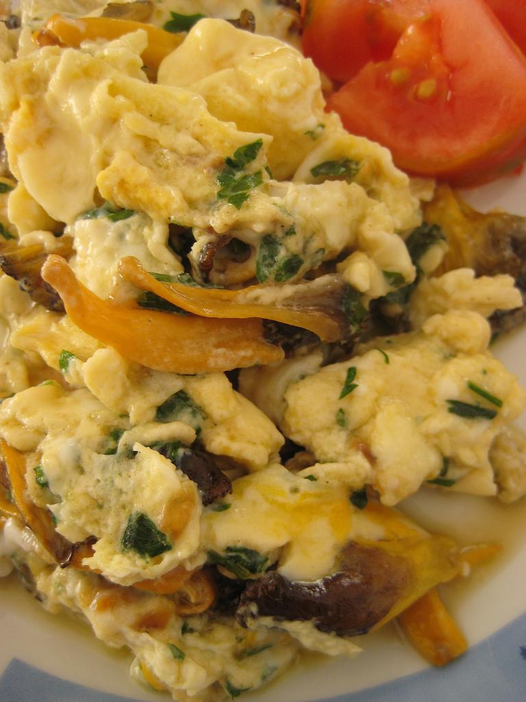 fried eggs with mushrooms and cheese