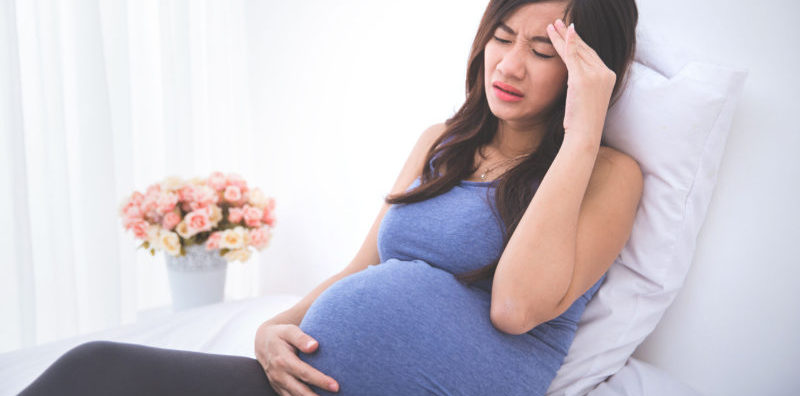 pregnant woman has a headache