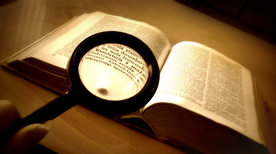 book with magnifier