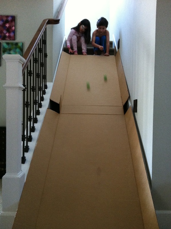 Cardboard slide in the house