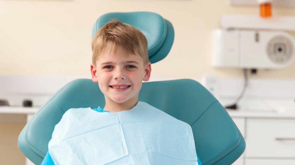осмотр стоматолога детей