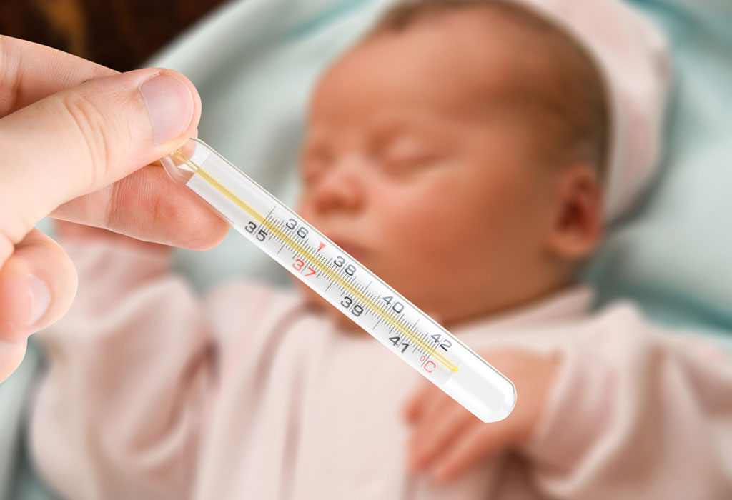 Медицинский термометр и малыш