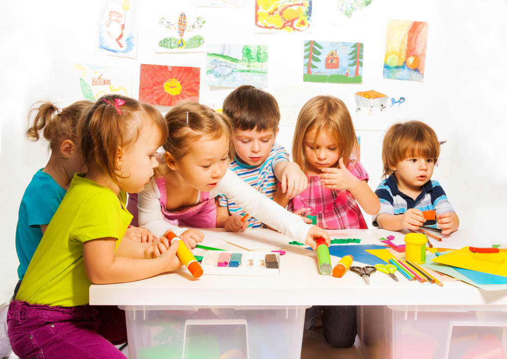 children play a board game