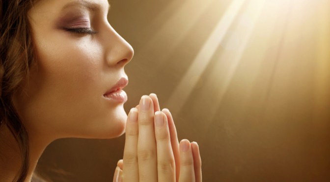 woman prays