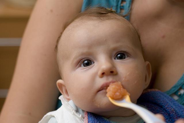 feeding a baby at 5 months