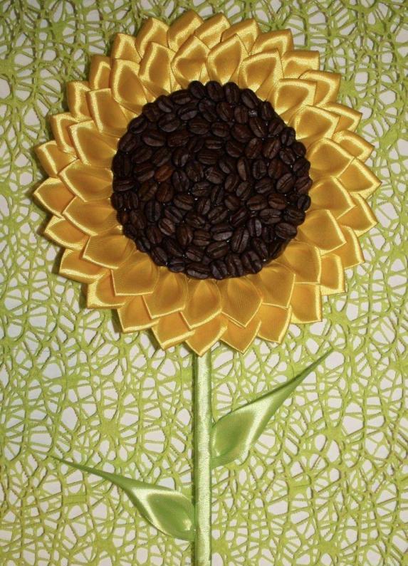 Sunflower made of ribbons and coffee