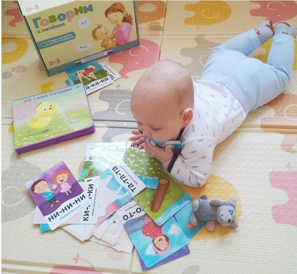 kid playing with cards