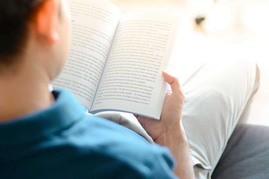 man is reading a book