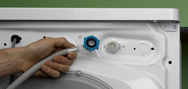 connecting the washing machine to the water supply