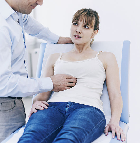 doctor examination for abdominal pain