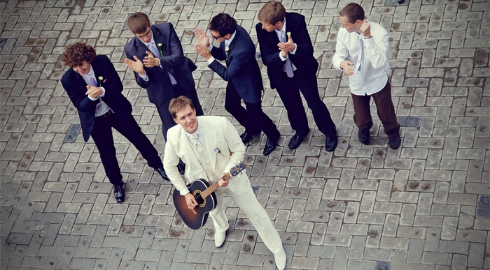 the groom sings a serenade