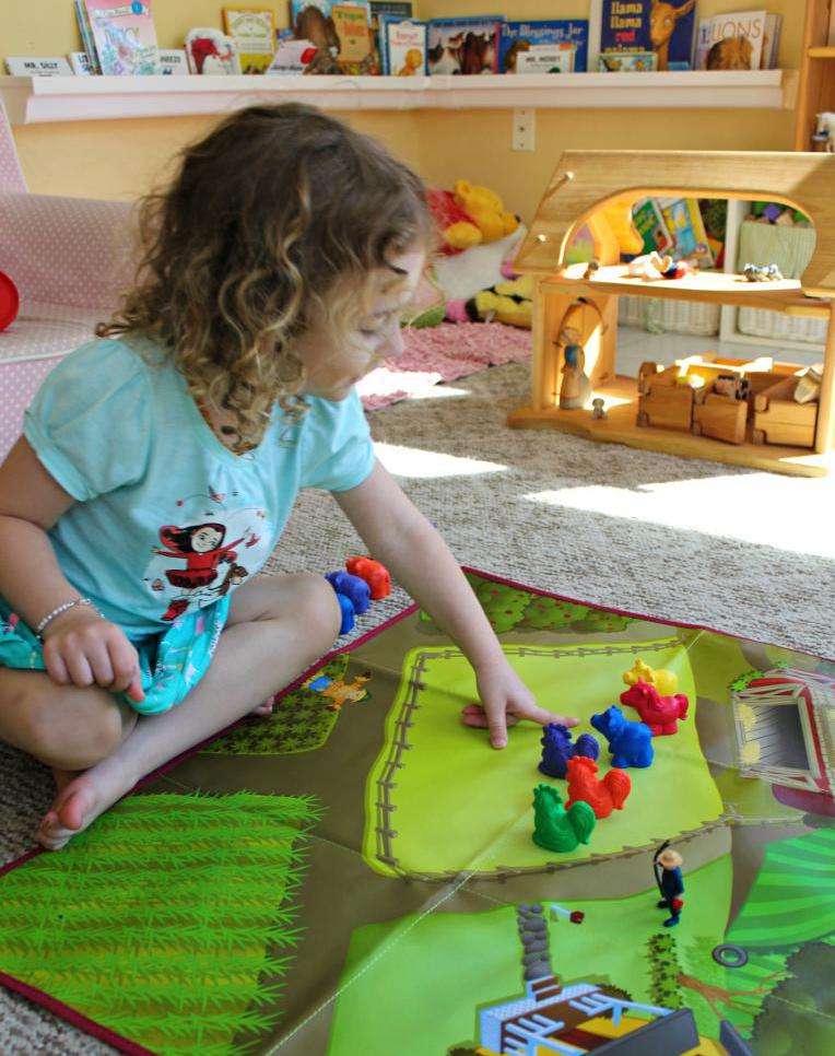 girl playing with toys