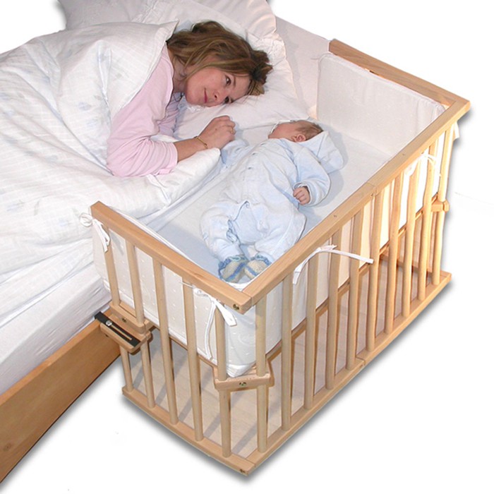 Детская кровать с бортиком акушерство