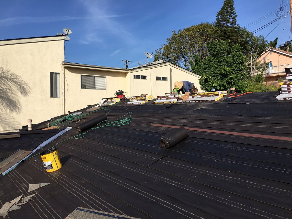 repair of the roof of an apartment building