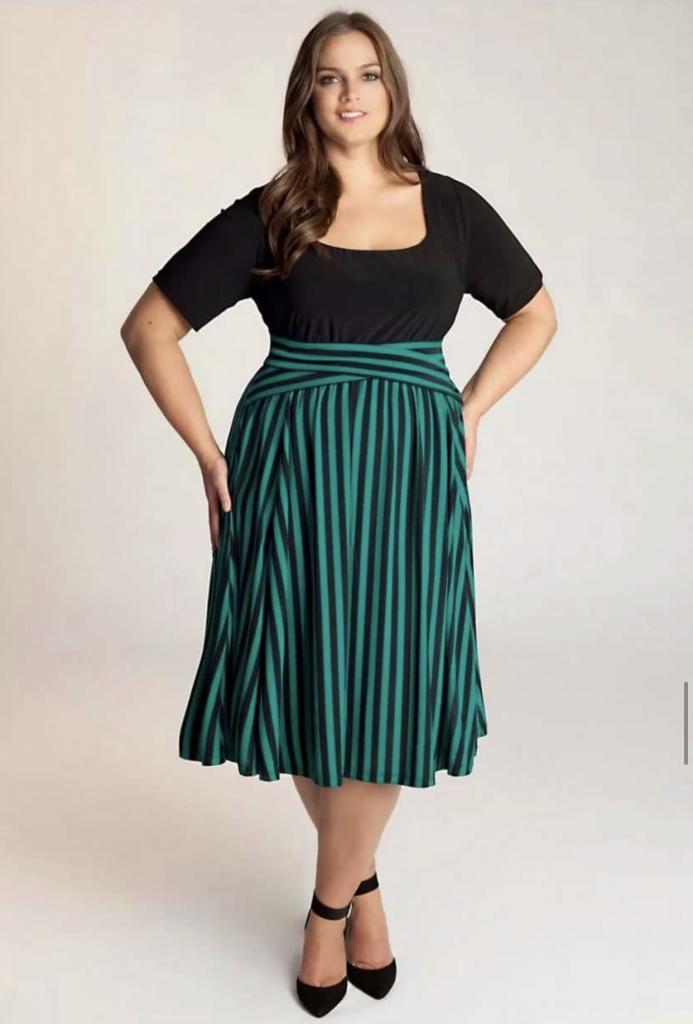 striped skirt with a black blouse