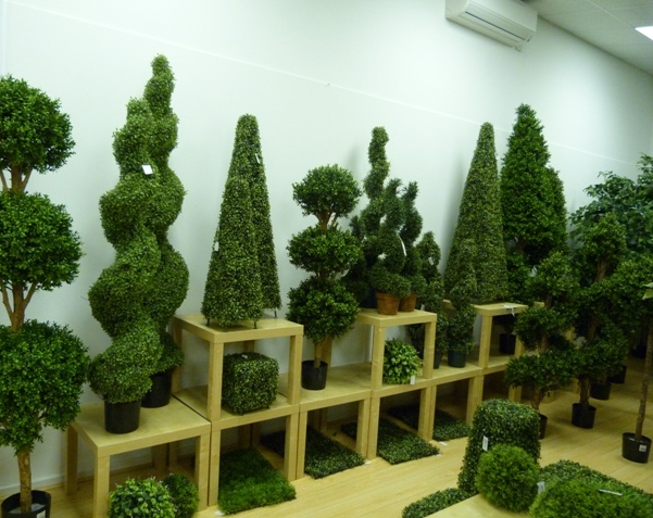 Decoratively trimmed trees.