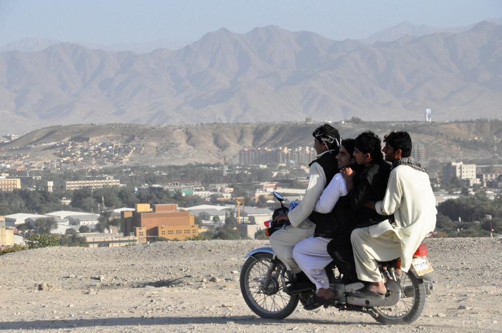 Afghans on a motorcycle