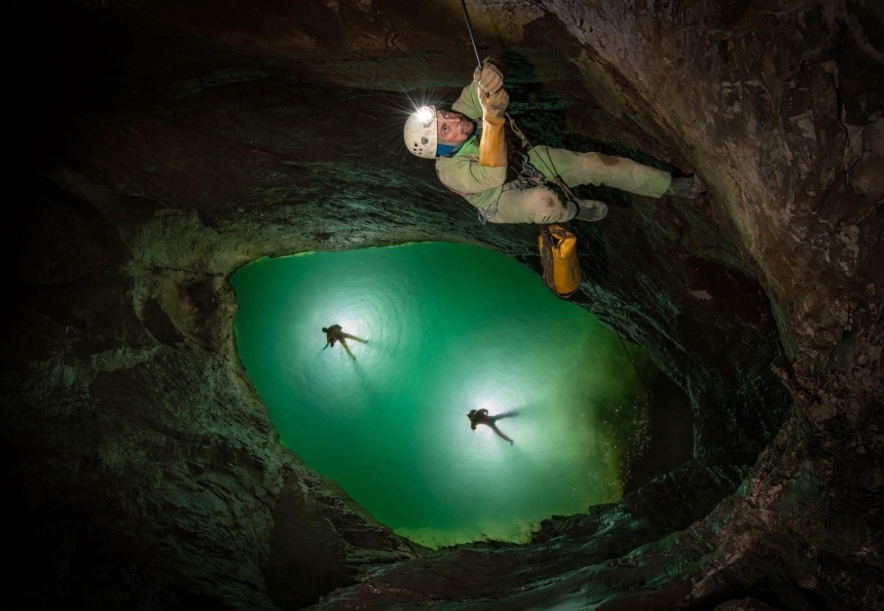 turquoise lake in Verevkina cave