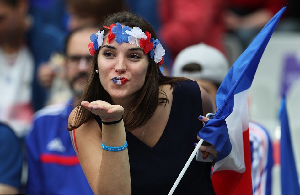 Girl in the colors of the French flag