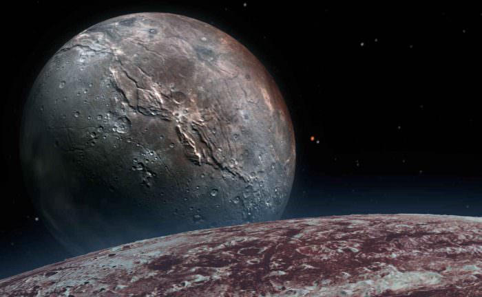 Плутон и его спутник