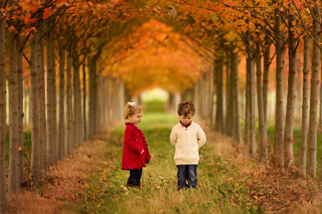 Boy and girl in the fall