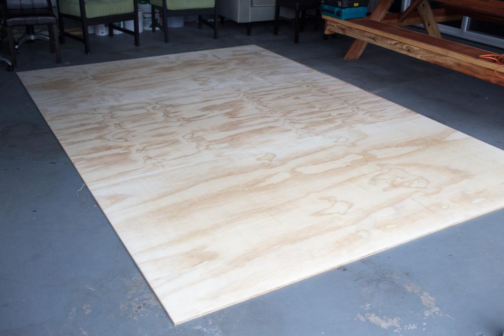 Plywood sheet on the floor.