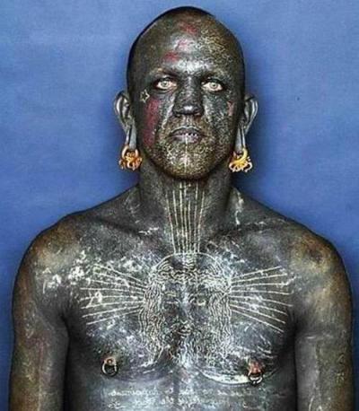 Парень с татуировками по всему телу имя. Кто он, самый татуированный человек в мире? Цветовая гамма татуировки человек